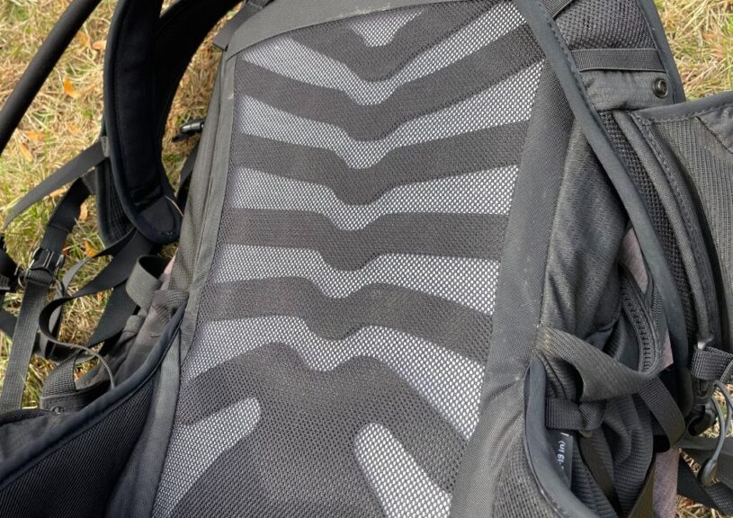 The frame on a black hiking backpack.
